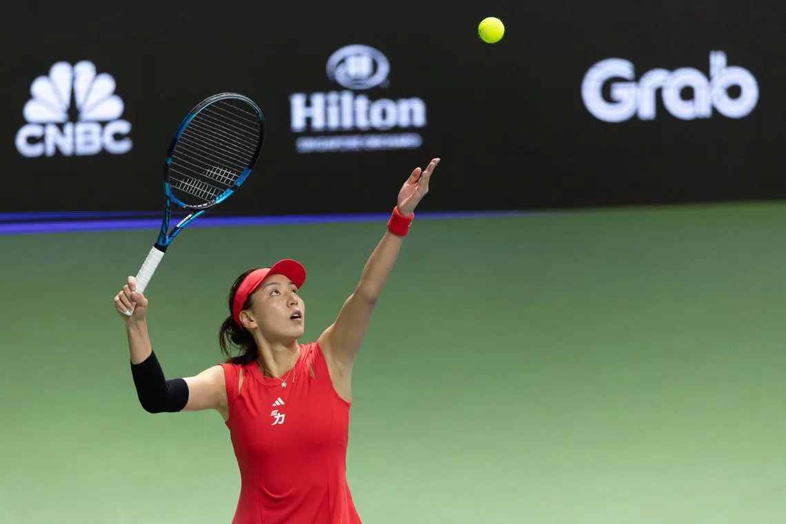 Wang Xinyu gets a 6-4, 5-7, 7-5 first round win over Rebecca Marino of Canada in the Singapore Tennis Open on Jan 28.

