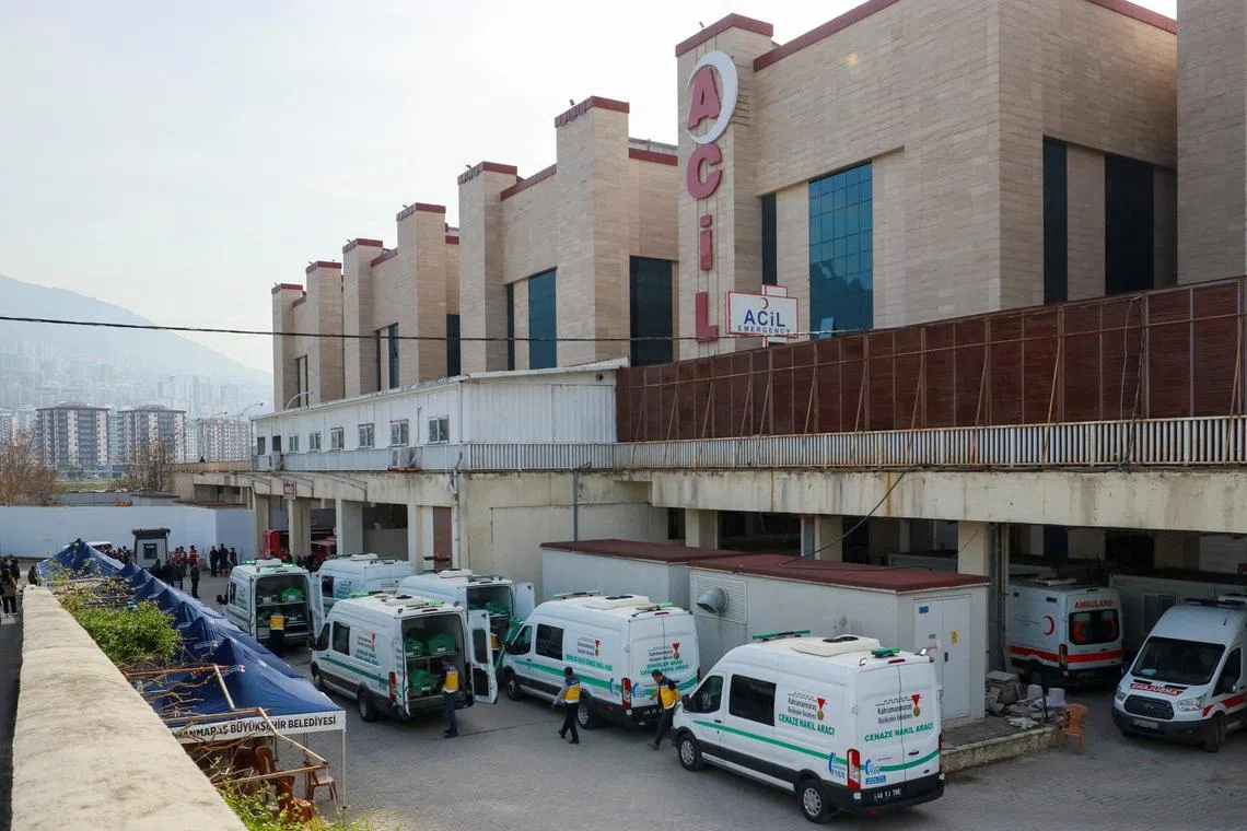 Mortuary vans are parked in front of a hospital morgue, after a deadly shooting at a school, in Kahramanmaras, Turkey, April 16, 2026. REUTERS/Ensar Ozdemir