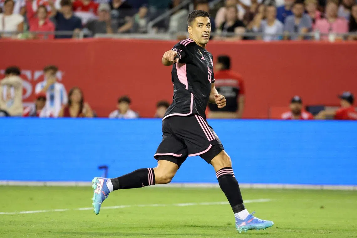 Aug 31, 2024; Chicago, Illinois, USA; Inter Miami CF forward Luis Suarez (9) celebrates after scoring a goal against Chicago Fire FC in the second half at Soldier Field. Mandatory Credit: Mike Dinovo-USA TODAY Sports