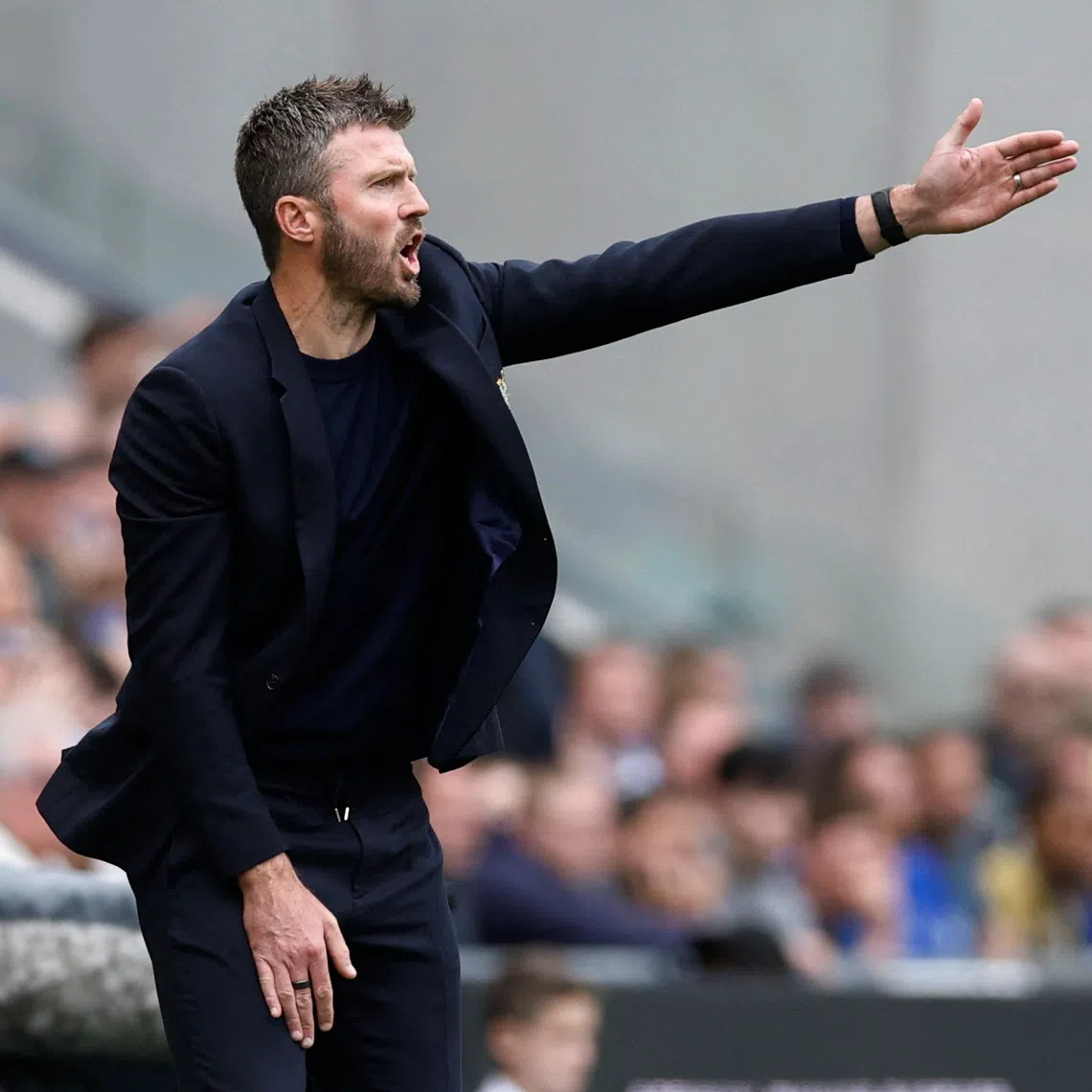 Manchester United manager Michael Carrick instructing his players during the 2-2 Premier League draw with Everton.