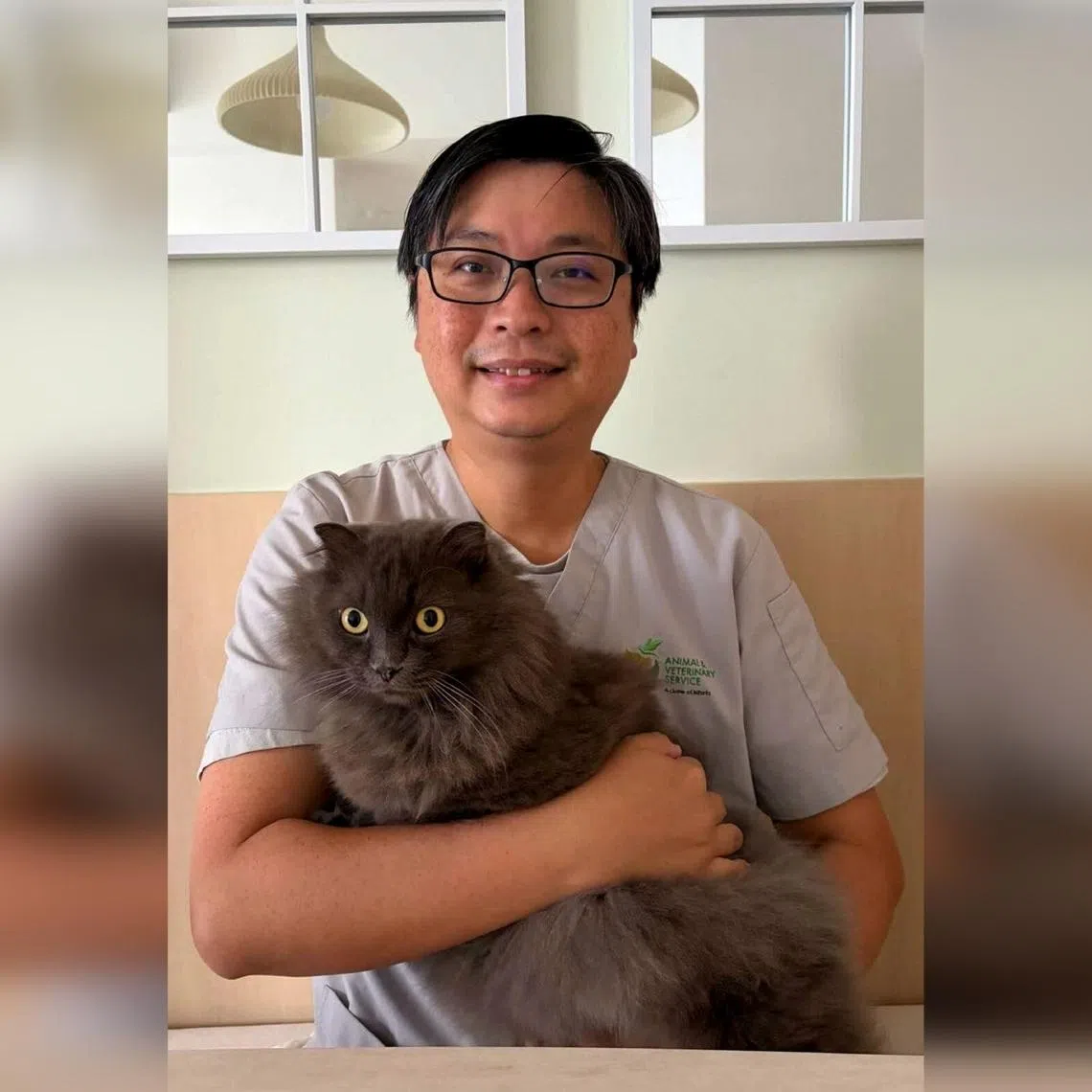Dr Colin Foo and his cat Pepe.