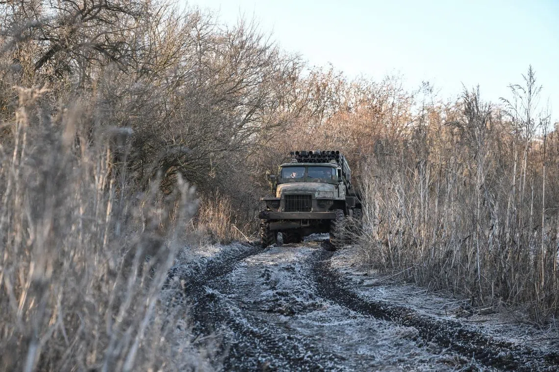 Service members of the 152nd Jaeger Brigade of the Ukrainian Armed Forces drive a BM-21 Grad multiple rocket launch system in a front line, amid Russia's attack on Ukraine, in Donetsk region, Ukraine December 25, 2025. REUTERS/Stringer
