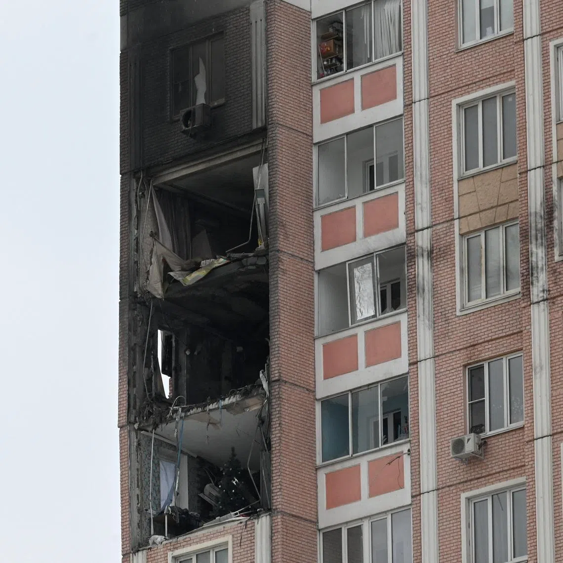 A multi-storey apartment block that local authorities say was damaged by debris from downed Ukrainian drones during an attack on the region, amid the Russia-Ukraine military conflict in Rostov-on-Don, Russia, January 14, 2026. REUTERS/Stringer