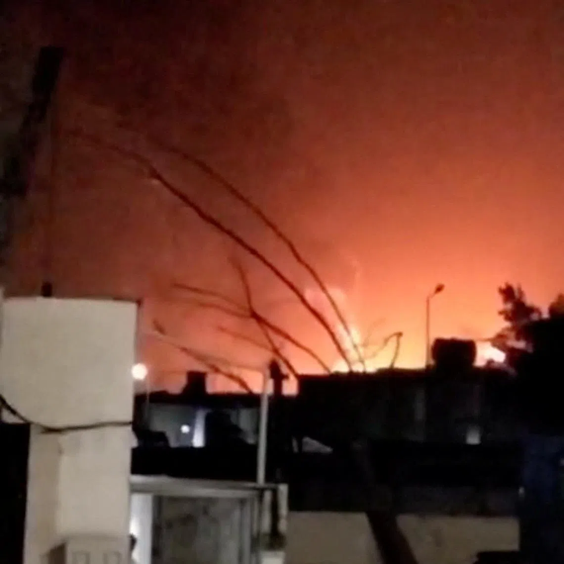 Smoke and flames rise from the direction of an industrial complex, after Saudi Arabia's defense ministry said that air defences intercepted and destroyed ballistic missiles launched towards the Eastern region, amid the U.S.-Israeli conflict with Iran, in Jubail, Saudi Arabia, in this screen grab taken from a social media video released on April 7, 2026. Social Media/via REUTERS