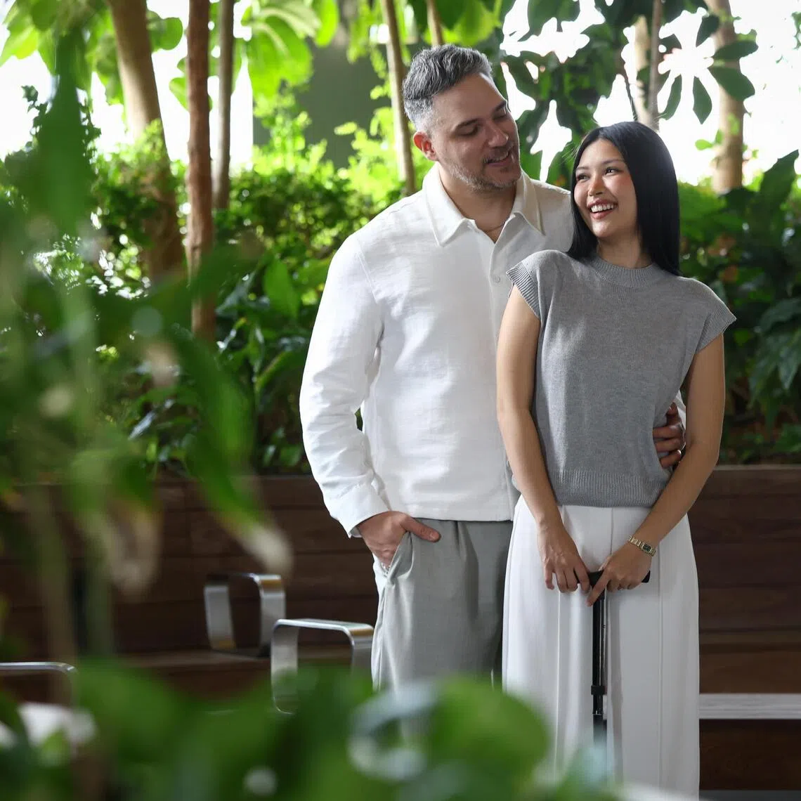 Hasyima Yusof (right) with her husband, Jaime Cruz, at the National Cancer Centre Singapore on July 21. Hasyima had spinal ependymoma, a very rare tumour that develops from the cells lining the spinal cord.