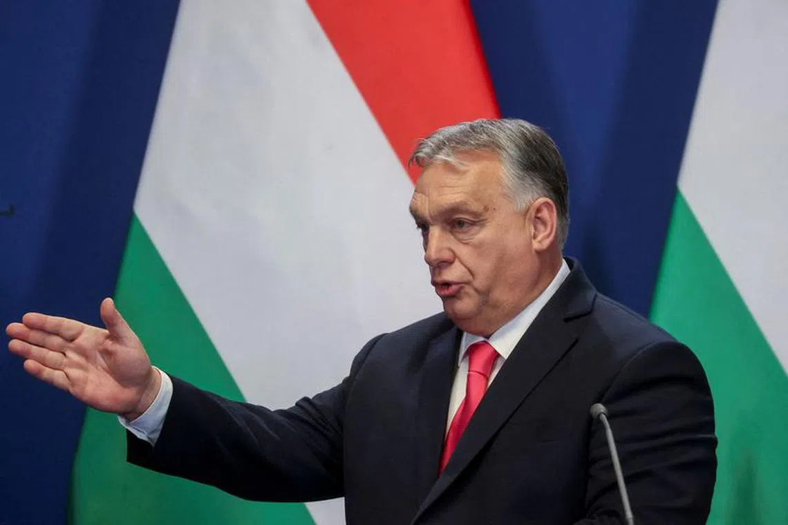 FILE PHOTO: Hungarian Prime Minister Viktor Orban gestures at a joint press conference with Slovak Prime Minister Robert Fico in Budapest, Hungary, January 16, 2024. REUTERS/Bernadett Szabo/File Photo
