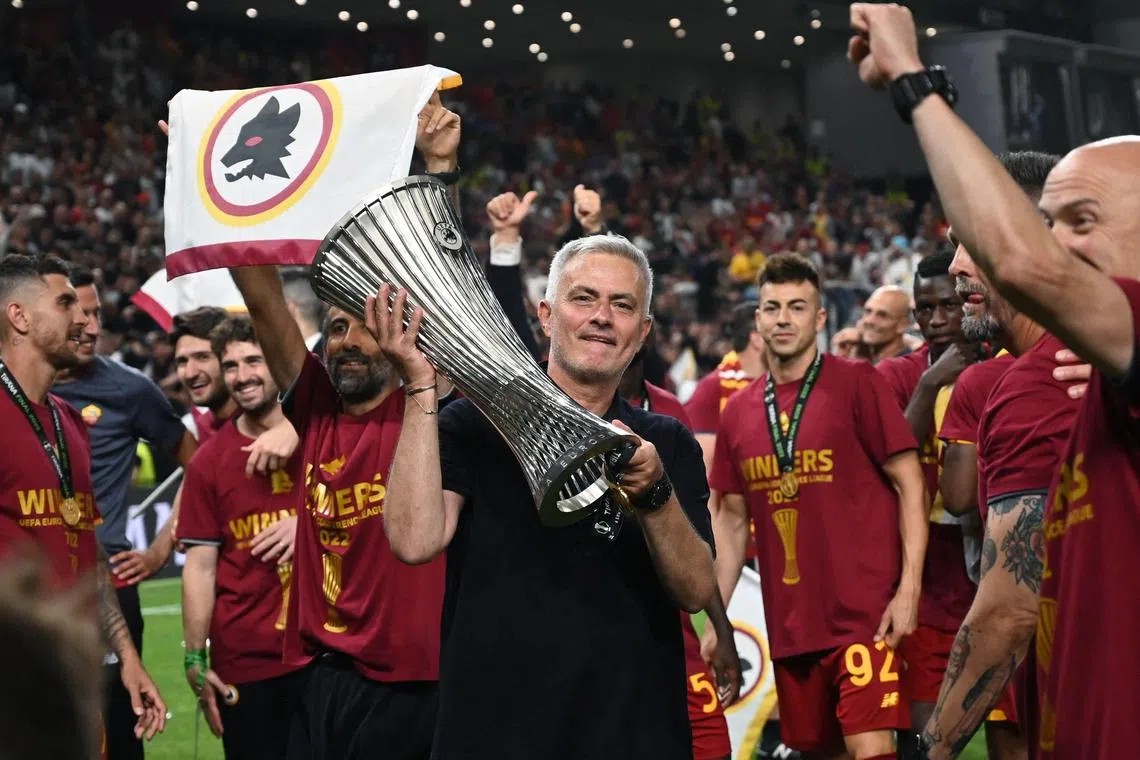 Roma coach Jose Mourinho celebrating after winning the inaugural Europa Conference League last season.
