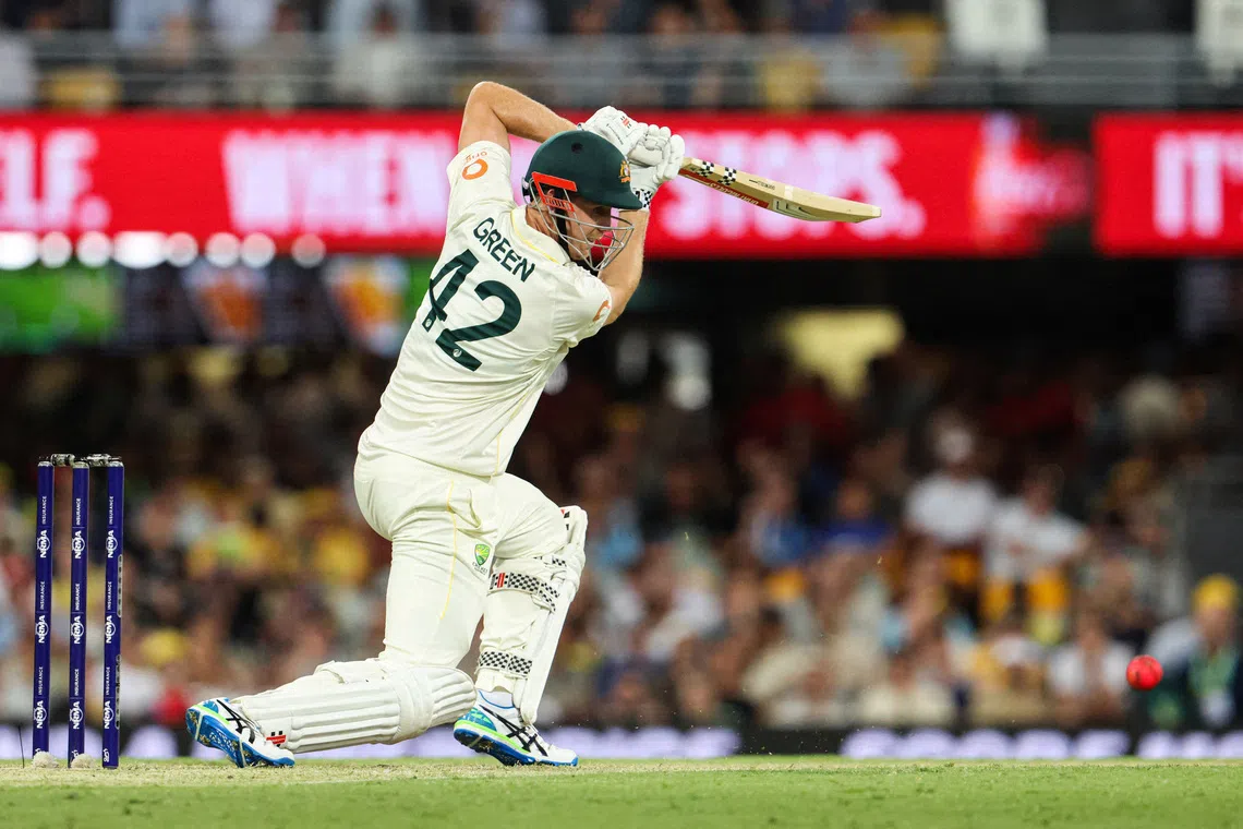 FILE PHOTO: Cricket - The Ashes - Australia v England - Second Test - The Gabba, Brisbane, Australia - December 5, 2025 Australia's Cameron Green in action. REUTERS/Hollie Adams/File Photo