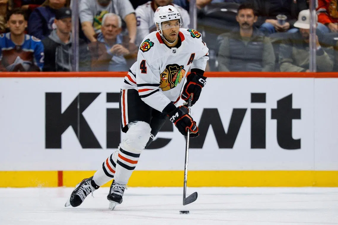 Oct 28, 2024; Denver, Colorado, USA; Chicago Blackhawks defenseman Seth Jones (4) controls the puck in the third period against the Colorado Avalanche at Ball Arena. Mandatory Credit: Isaiah J. Downing-Imagn Images/ File Photo