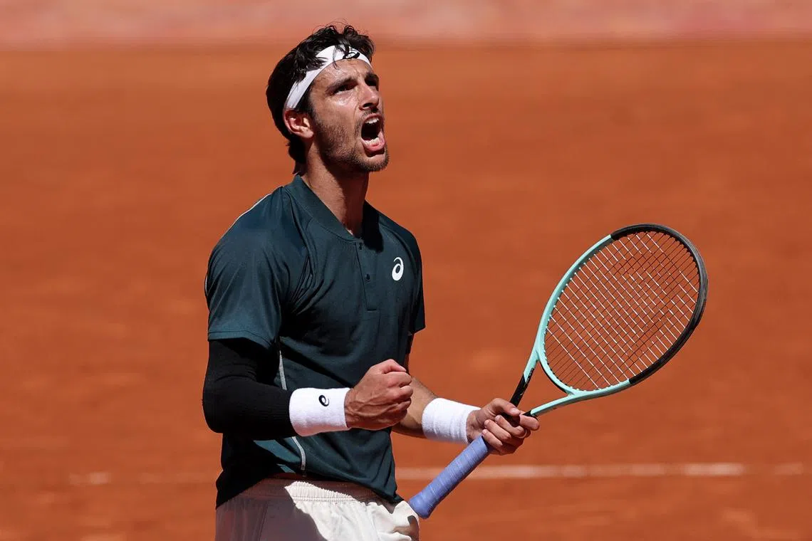 Tennis - French Open - Roland Garros, Paris, France - May 30, 2025 Italy's Lorenzo Musetti celebrates after winning his third round match against Argentina's Mariano Navone REUTERS/Gonzalo Fuentes