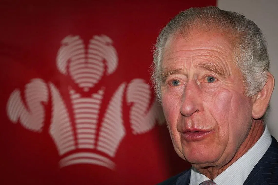 FILE PHOTO: King Charles III stands by the logo of  \"The Prince's Trust\" as he welcomes guests during a reception for African business leaders, at the Garrison Chapel, Chapel Barracks, in London, Britain on October 18, 2023. ADRIAN DENNIS/Pool via REUTERS/File Photo