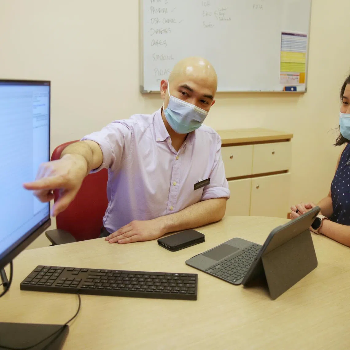A mock consultation session using CARES-ML with Associate Professor Hairil Rizal, Senior Consultant, Anesthesiology, SGH, before a surgery at the Pre-Admissions Centre on June 28, 2023.