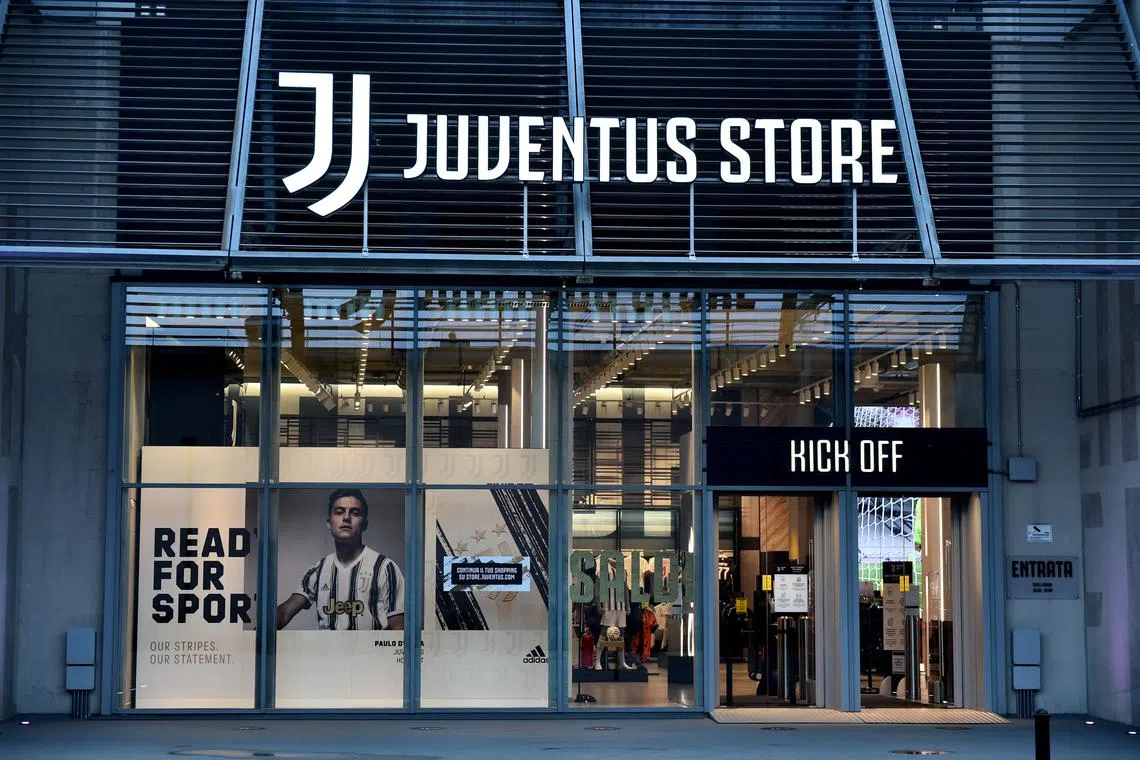 FILE PHOTO: Soccer Football - Coppa Italia - Semi Final Second Leg - Juventus v Inter Milan - Allianz Stadium, Turin, Italy - February 9, 2021  General view of the merchandise store outside the stadium before the match REUTERS/Massimo Pinca/File Photo