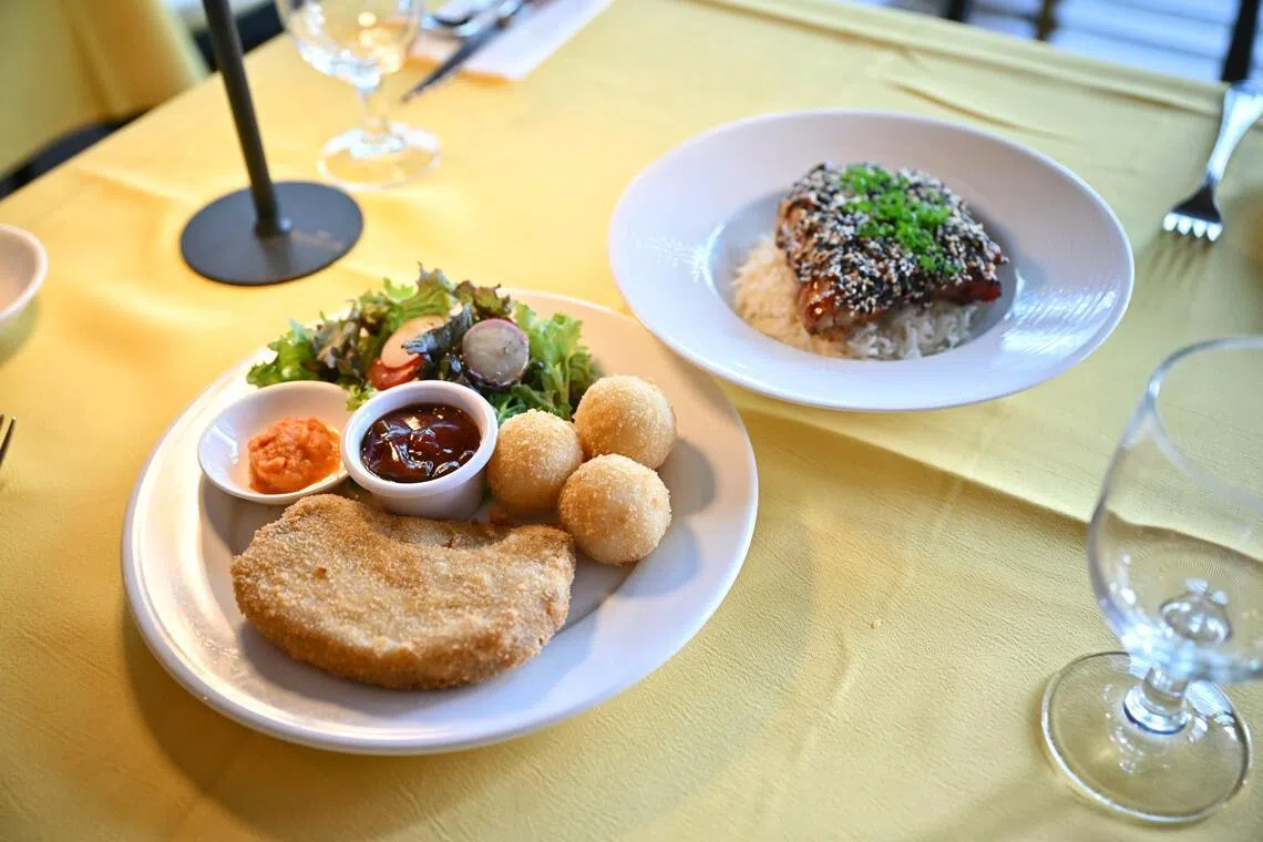 Set lunch options at Shashlik include Hainanese pork chop (left) and pork ribs with chicken rice (right). 
