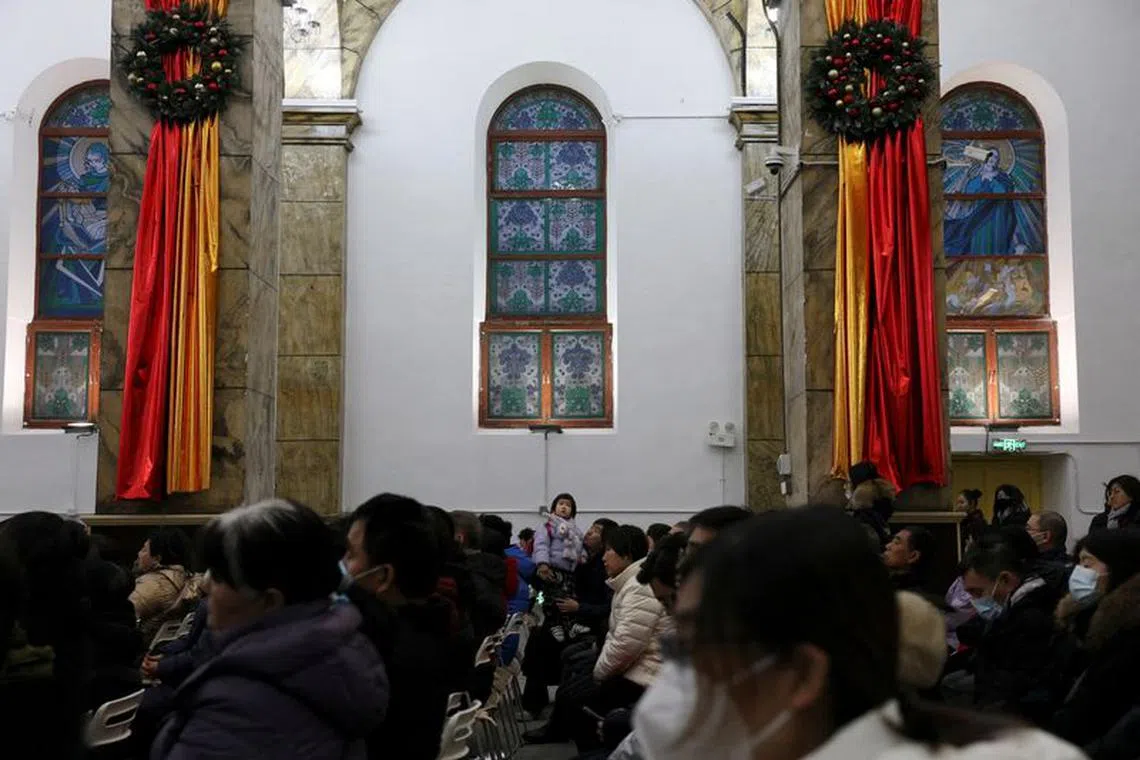 Worshippers attend Christmas Eve mass at the South Cathedral, a Catholic church at Xuanwumen in Beijing, China December 24, 2023. REUTERS/Florence Lo/File Photo