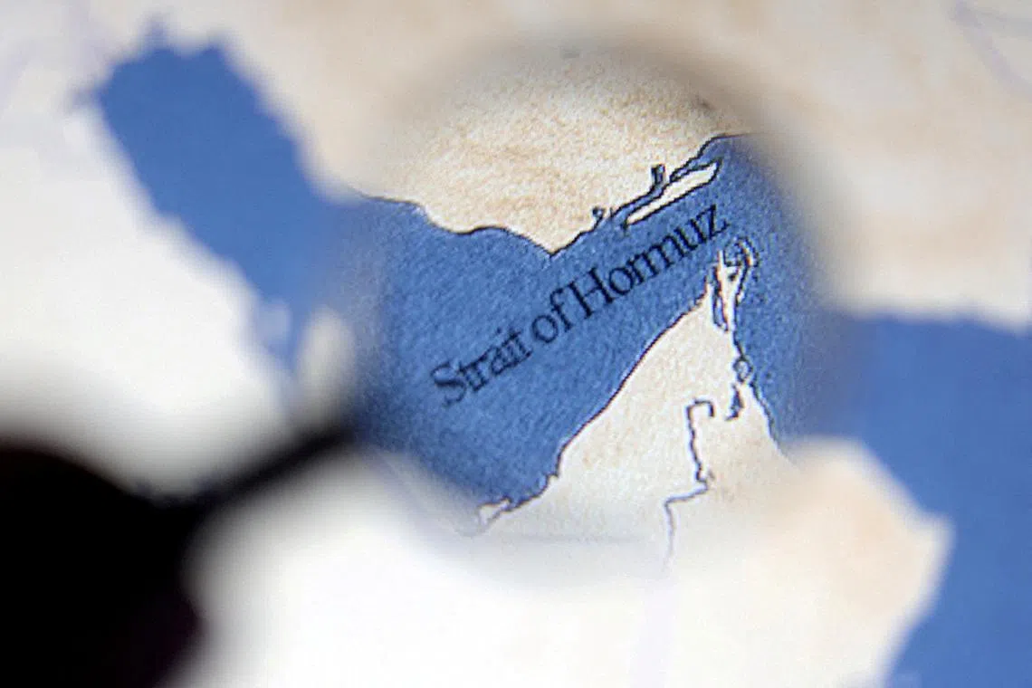 FILE PHOTO: A map showing the Strait of Hormuz is seen in this illustration taken June 22, 2025. REUTERS/Dado Ruvic/Illustration//File Photo