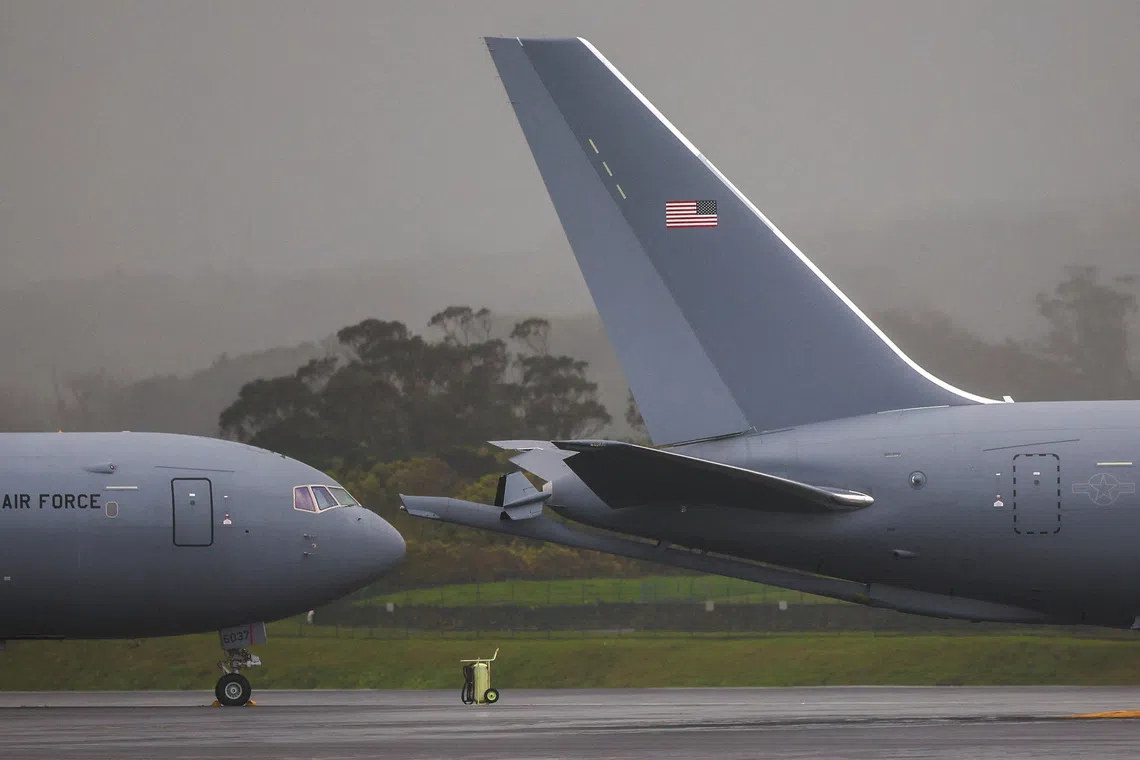 FILE PHOTO: U.S. military planes on the tarmac of Lajes air base in Terceira island, Azores, Portugal, February 21, 2026. REUTERS/Pedro Nunes/File Photo