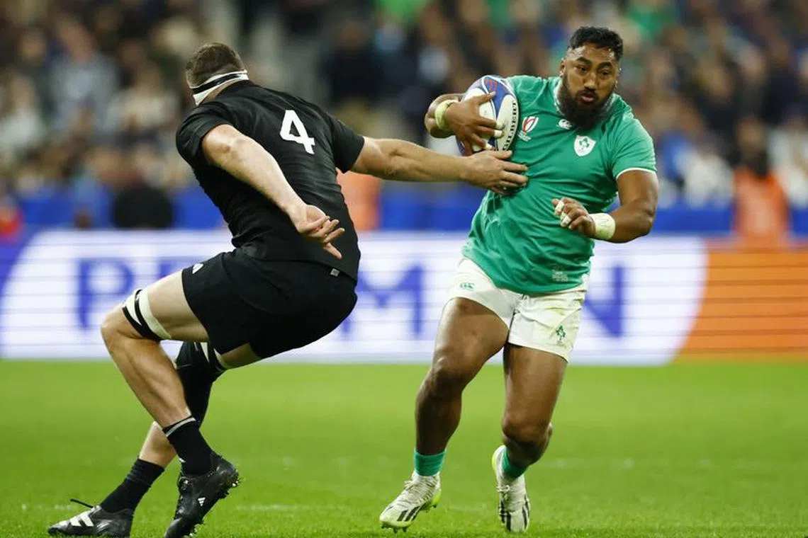 Rugby Union - Rugby World Cup 2023 - Quarter Final - Ireland v New Zealand - Stade de France, Saint-Denis, France - October 14, 2023 Ireland's Bundee Aki in action with New Zealand's Brodie Retallick REUTERS/Sarah Meyssonnier/File Photo