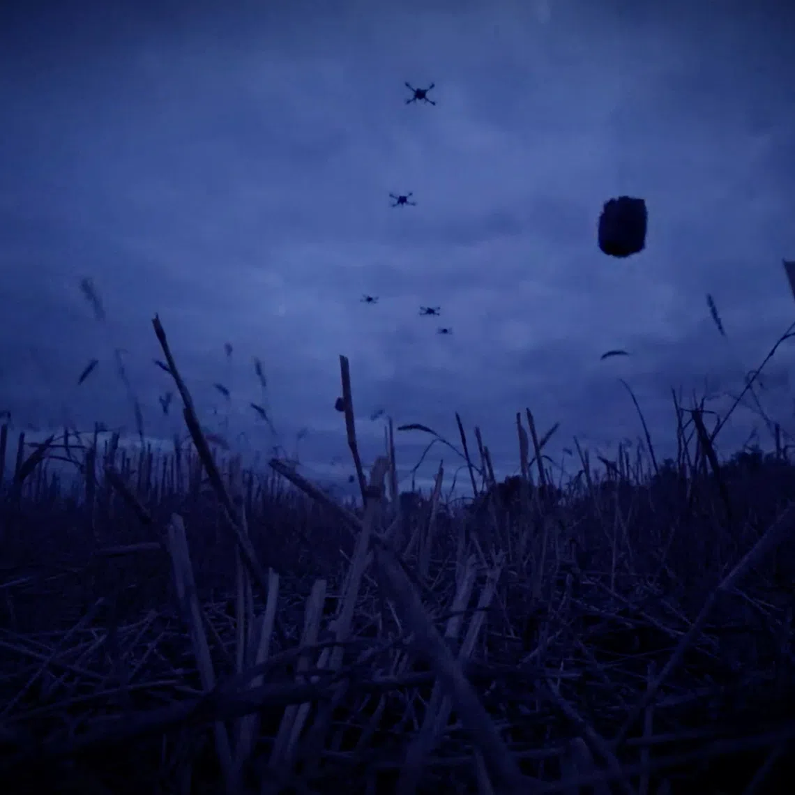 Drones carrying food packages fly over a location given as Oleshky, Kherson Region, Russian-controlled Ukraine, in this still image obtained from a video released on September 27, 2026. Oleksandr Prokudin, head of Kherson Regional Military Administration via Telegram/Handout via REUTERS
