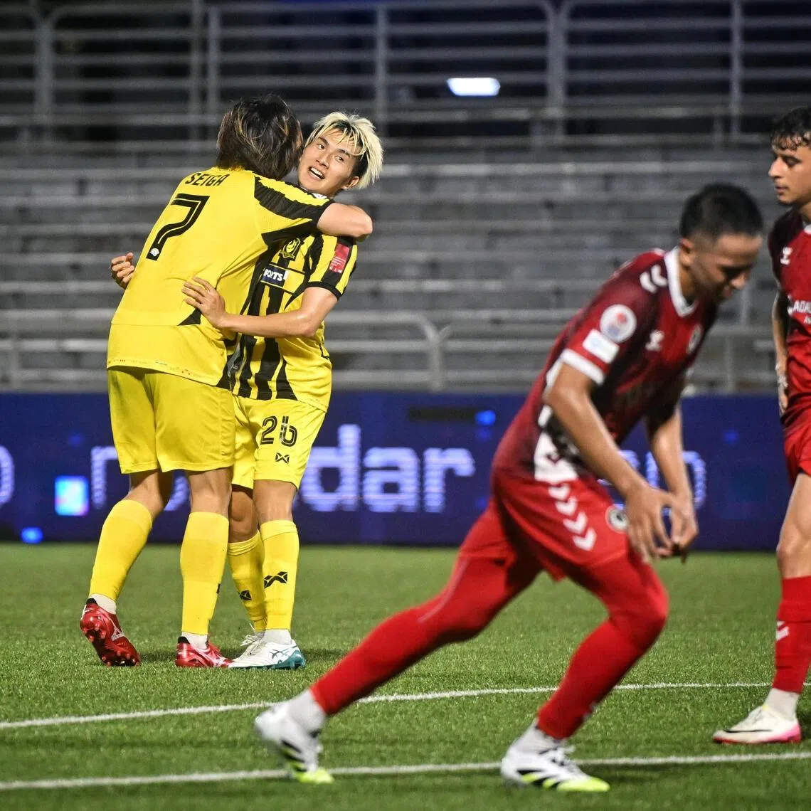 BG Tampines Rovers left-back Takeshi Yoshimoto (second from left) celebrates with Seiga Sumi after scoring the opener in the 3-0 win over Tanjong Pagar United at the Jurong East Stadium.
