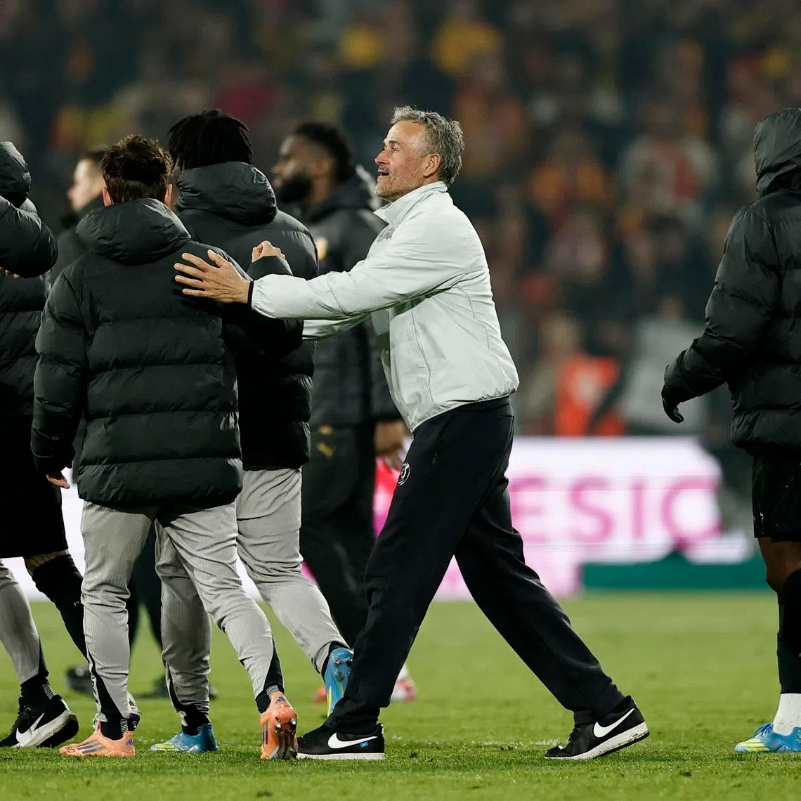 Soccer Football - Ligue 1 - RC Lens v Paris St Germain - Stade Bollaert-Delelis, Lens, France - May 13, 2026  Paris St Germain coach Luis Enrique celebrates after winning Ligue 1 REUTERS/Benoit Tessier