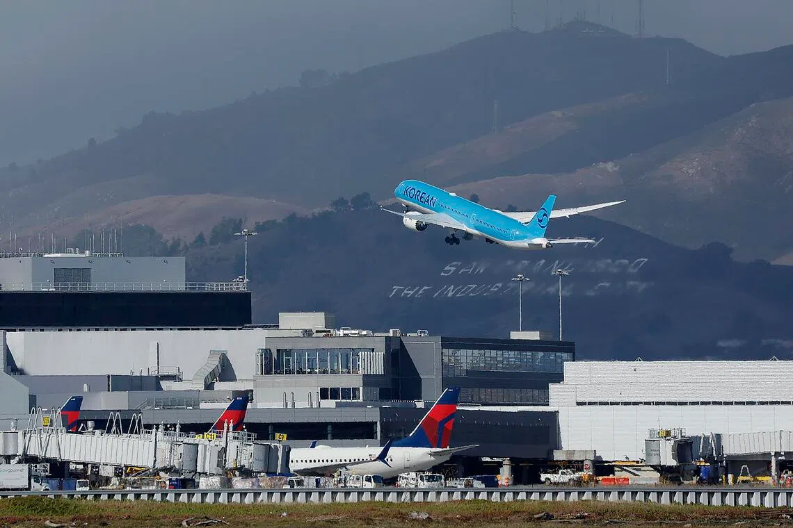 A Korean airlines passenger jet takes off at the San Francisco International Airport in California, USA, on Nov 14. 