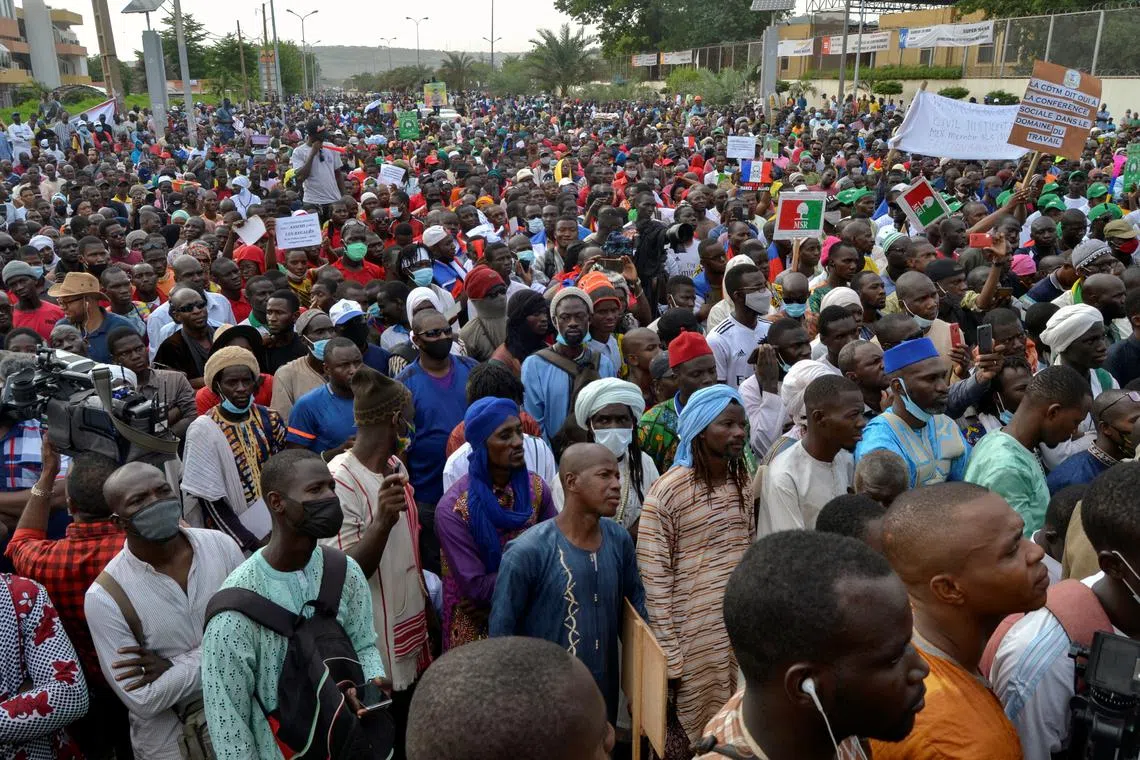 FILE PHOTO: Supporters of Mali's M5-RFP opposition coalition, gather during a rally to mark a year since the start of protest marches that contributed to the ouster of former President Ibrahim Boubakar Keita at the Independence Square in Bamako, Mali June 4, 2021. REUTERS/Amadou Keita/File Photo