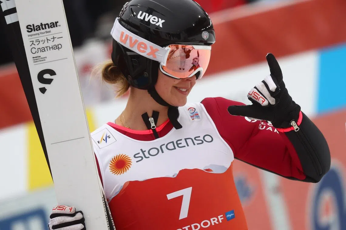 FILE PHOTO: Nordic Skiing - FIS Nordic World Ski Championships - Oberstdorf, Germany - February 27, 2021 Annika Malacinski of the U.S. reacts during the women's nordic combined HS 106 ski jumping competition REUTERS/Kai Pfaffenbach/File Photo