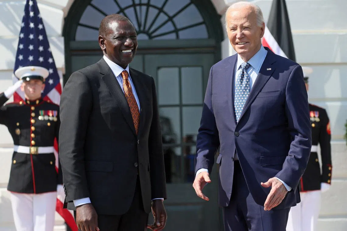 U.S. President Joe Biden welcomes Kenyan President William Ruto at the South Portico of the White House in Washington, U.S., May 22, 2024. REUTERS/Leah Millis