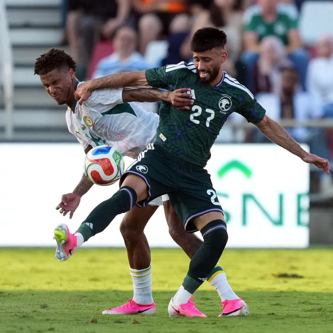 Soccer Football - International Friendly - Saudi Arabia v Senegal - Toyota Field, San Antonio, Texas, U.S. - June 9, 2026  Saudi Arabia's Sultan Mandash in action with Senegal's Moussa Niakhate IMAGN IMAGES via Reuters/Daniel Dunn