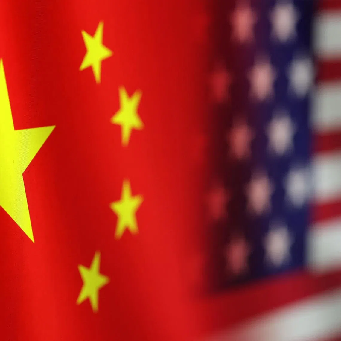 FILE PHOTO: U.S. and Chinese flags are seen in this illustration taken, January 30, 2023. REUTERS/Dado Ruvic/Illustration/File photo