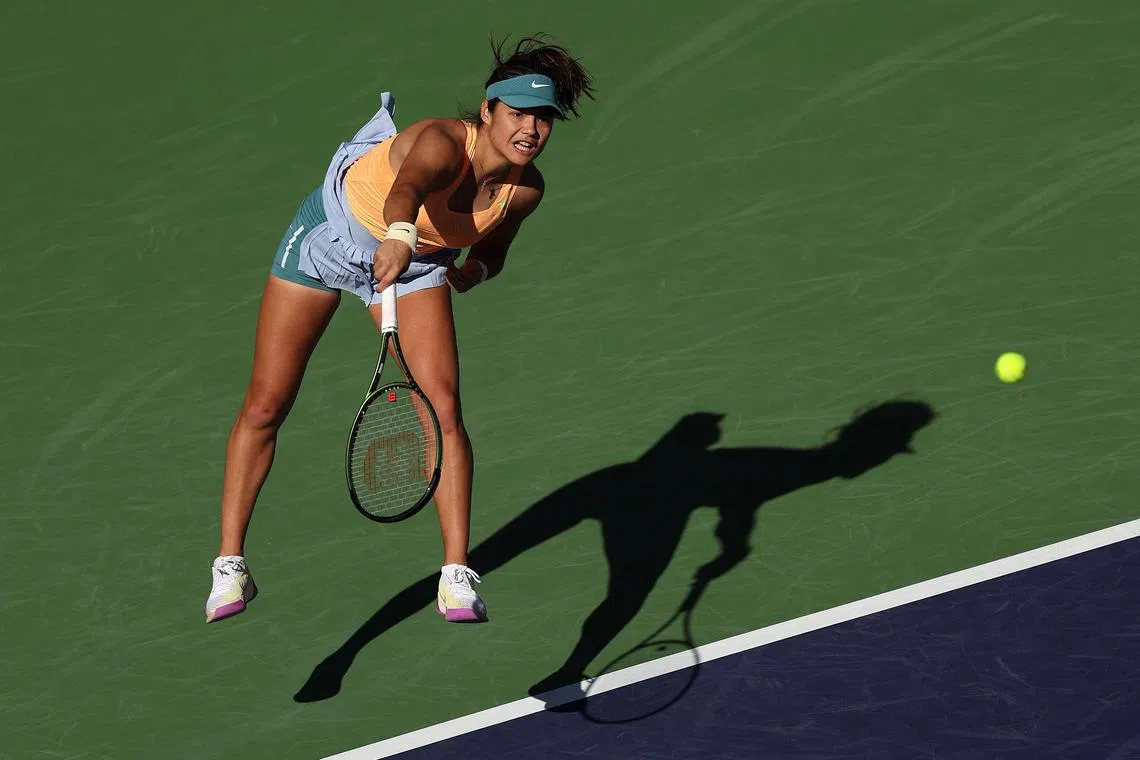 Britain's Emma Raducanu serving to Danka Kovinic of Montenegro in the first round of the BNP Paribas Open in Indian Wells.