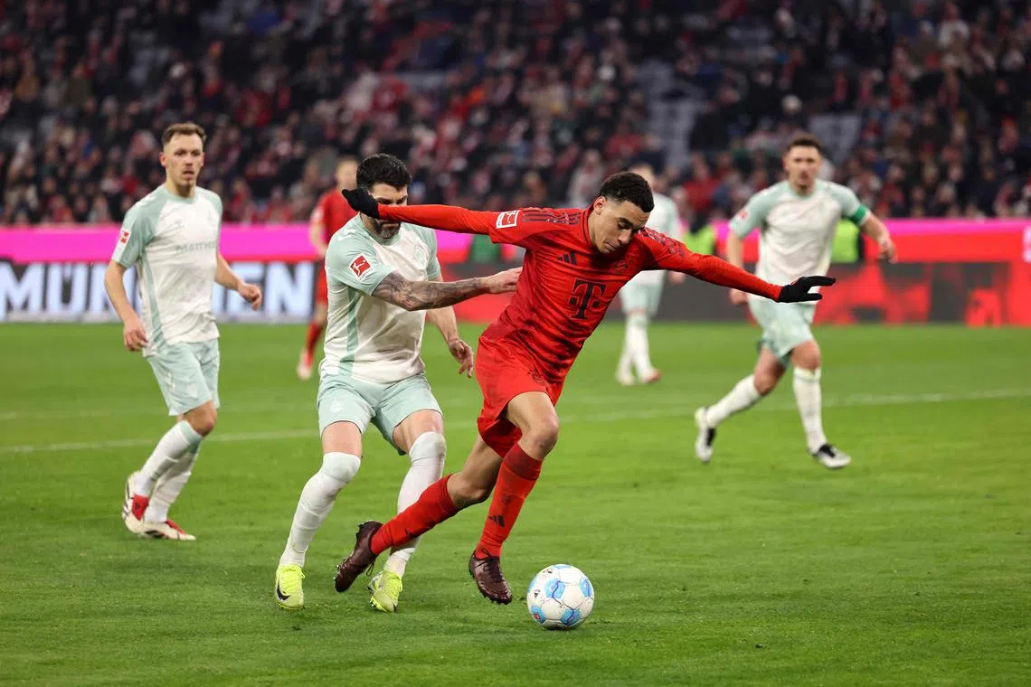 Bayern Munich's German midfielder Jamal Musiala (above in red) has established himself alongside Harry Kane as the team's two most productive attacking outlets.