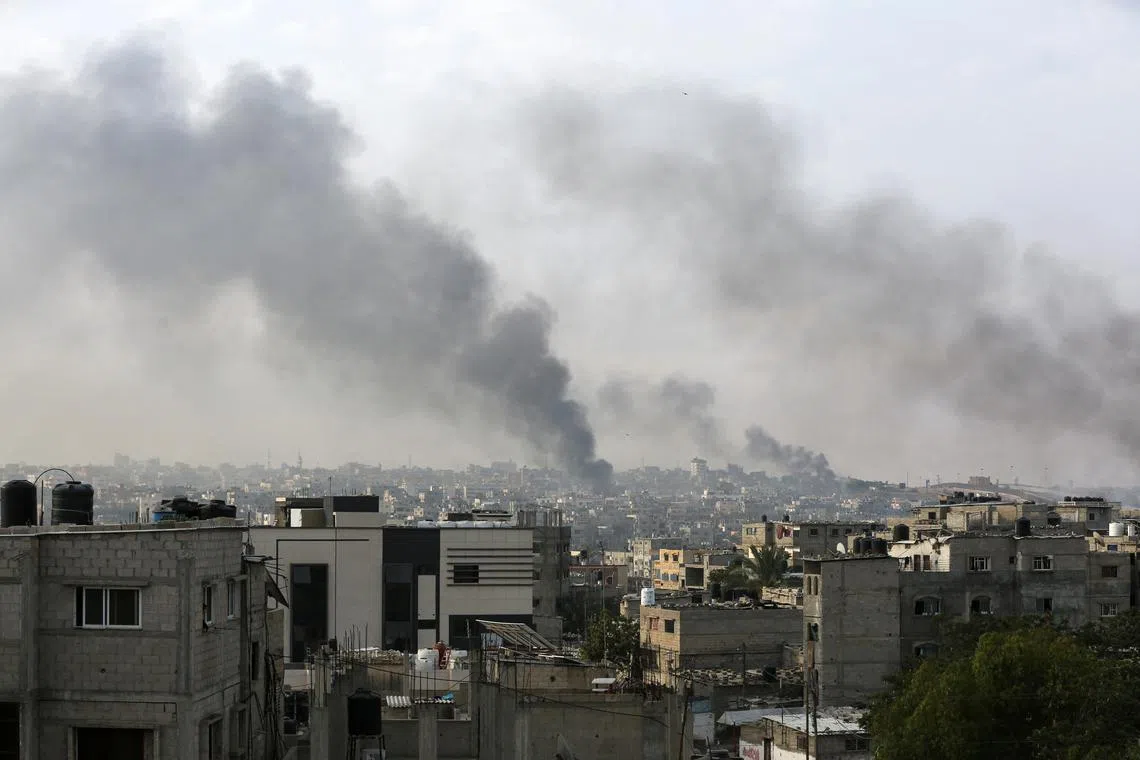 Smoke rises following Israeli strikes during an Israeli military operation in Rafah, in the southern Gaza Strip, May 28, 2024. REUTERS/Hatem Khaled