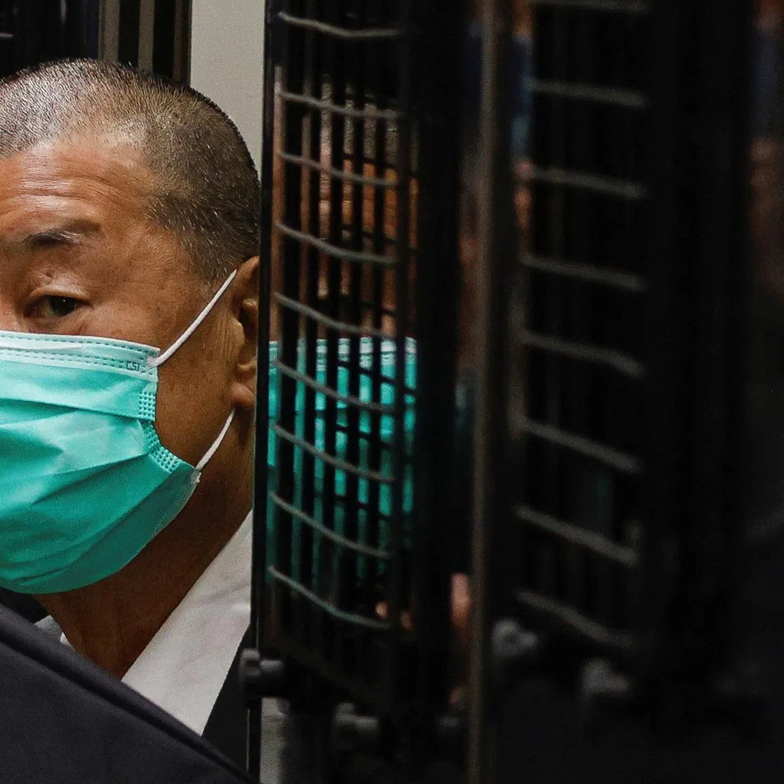 Media mogul Jimmy Lai, founder of Apple Daily, arrives the Court of Final Appeal by prison van in Hong Kong, China February 9, 2021. REUTERS/Tyrone Siu/File Photo