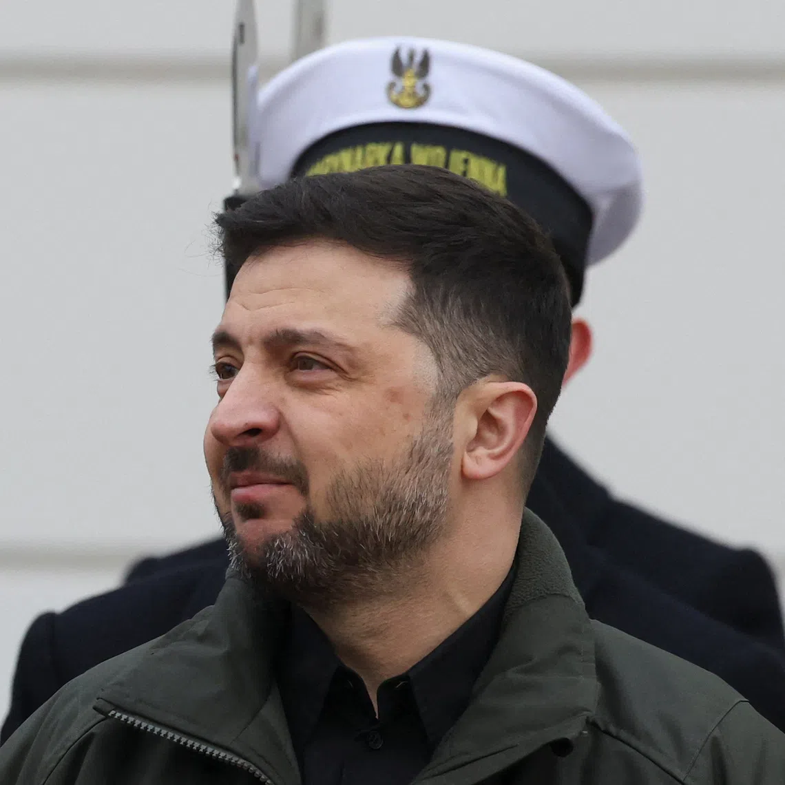 Ukrainian President Volodymyr Zelenskiy attends his welcoming ceremony at the courtyard of the Presidential Palace in Warsaw, Poland, December 19, 2025. REUTERS/Kacper Pempel