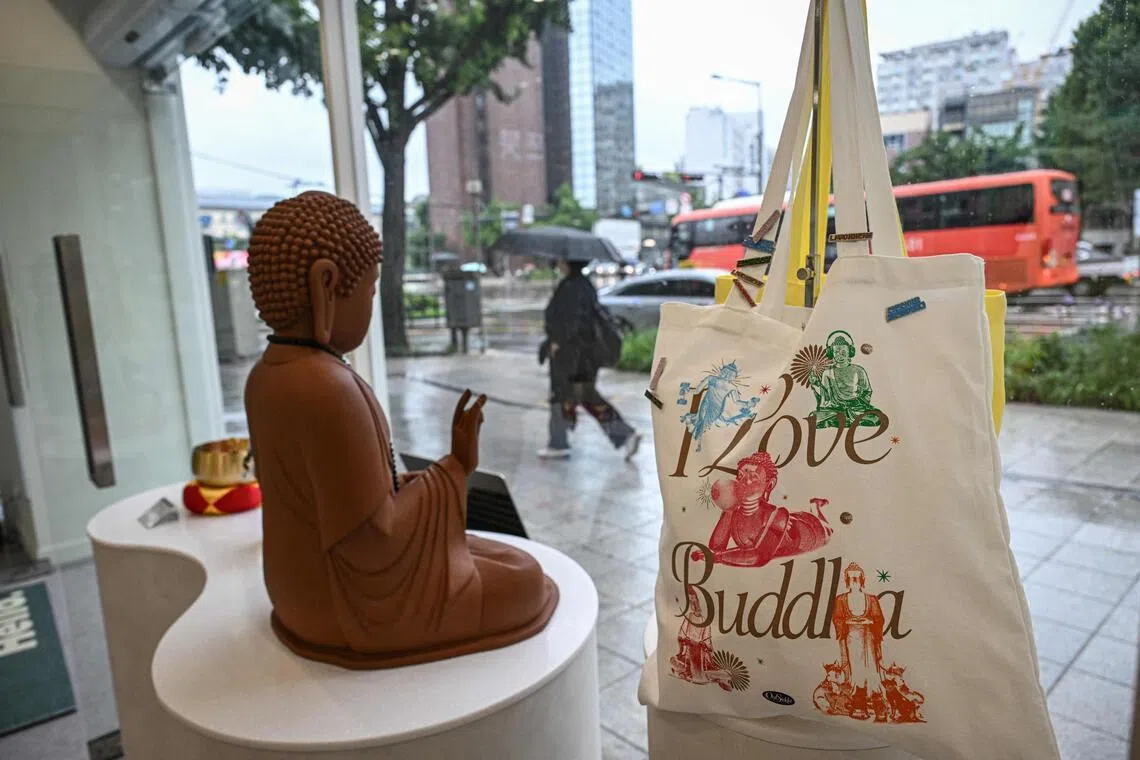 A Buddhism-themed tote bag displayed at a souvenir store in Seoul.