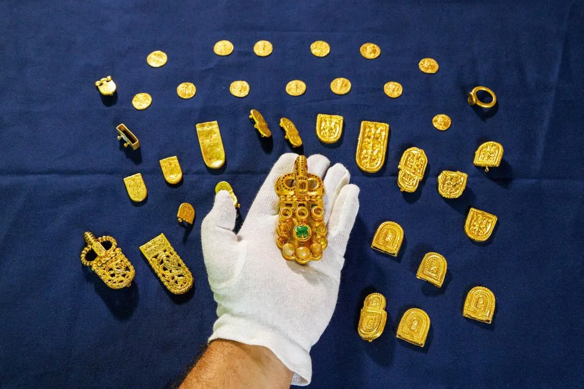 Igor Miholjek, head of research, Croatian Conservation Institute, Department of Underwater Archaeology, shows the gold found in a Byzantium shipwreck near Polace on the island of Mljet, Croatia, July 21, 2026. REUTERS/Antonio Bronic TPX IMAGES OF THE DAY