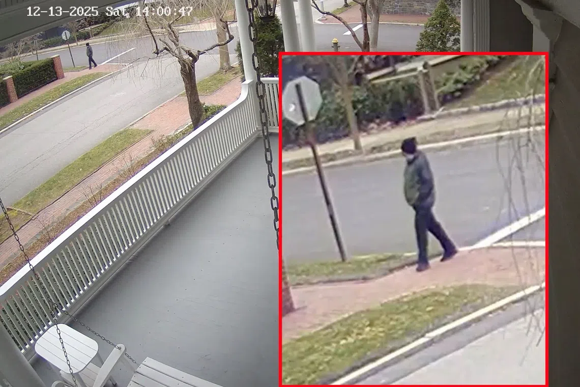 The person of interest in connection with the December 13, 2025 shooting at Brown University, in Providence, Rhode Island, U.S., walks in a screengrab from video released by the Providence Police. Providence Police/via REUTERS