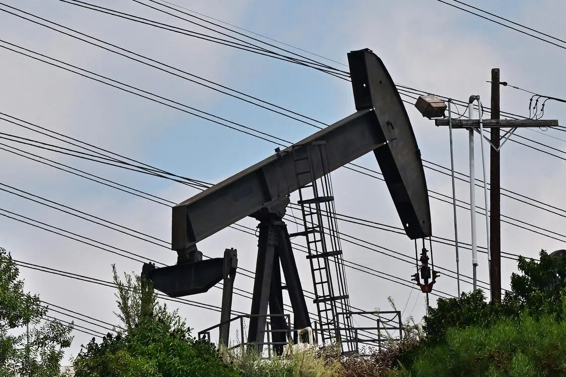 Working pumpjacks are seen at the Montebello Oil Field in Montebello, California, on September 18, 2023. Oil prices hit a 10-month high on September 15, 2023, after oil supply cuts in Saudi Arabia and Russia, as well as deadly flooding in Libya, have raised oil prices close to 100 USD per barrel. (Photo by Frederic J. BROWN / AFP)