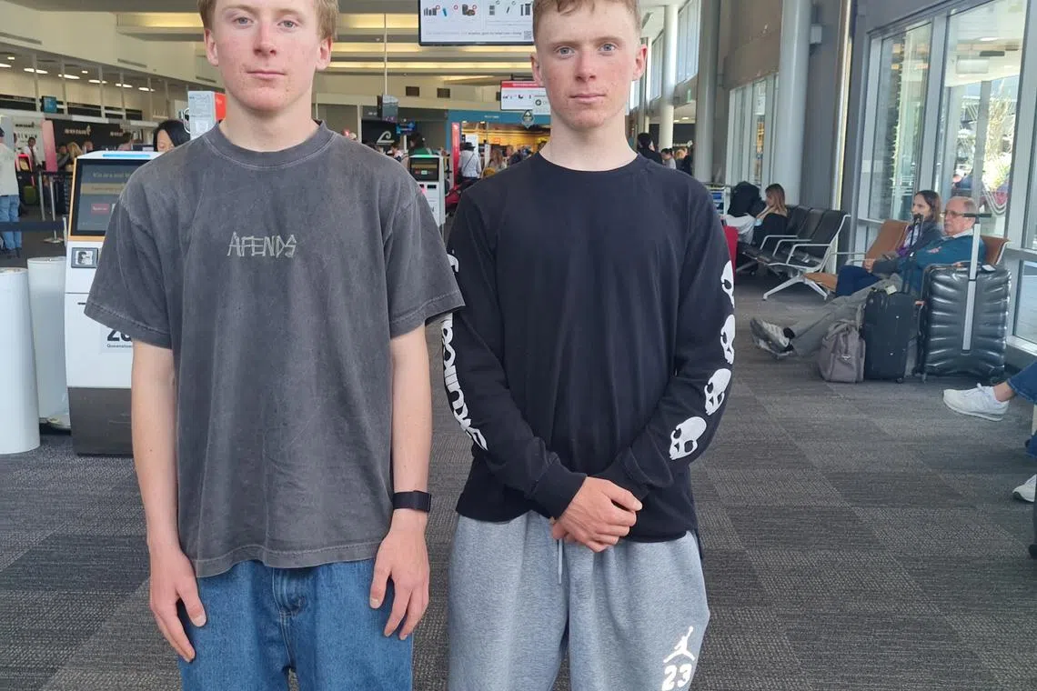 FILE PHOTO: Finley Melville Ives and Campbell Melville Ives pose for a photo at Queenstown Airport, New Zealand November 9, 2024. Karen Melville Ives/Handout via REUTERS/File Photo