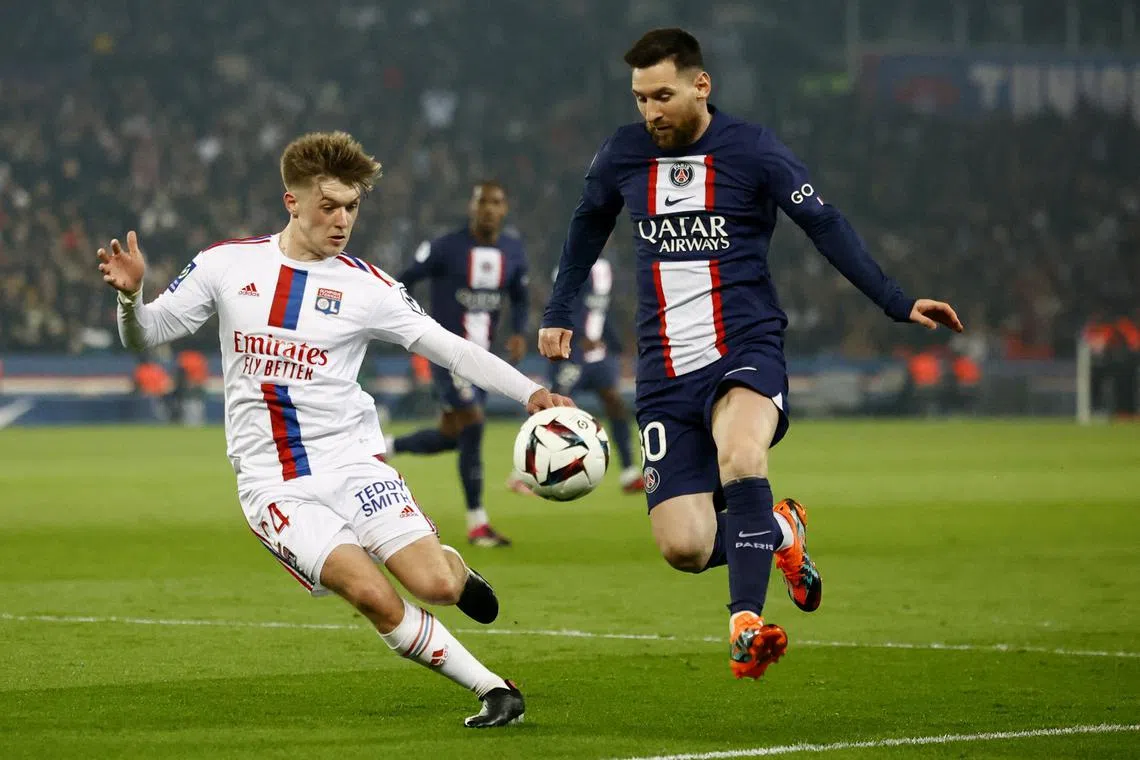 Paris St Germain's Lionel Messi in action with Olympique Lyonnais' Johann Lepenant. Lyon won 1-0. 