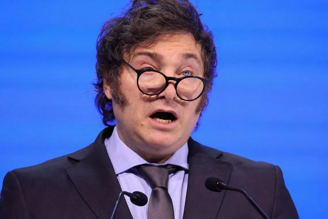 FILE PHOTO: Argentina's President Javier Milei speaks, during the 54th annual meeting of the World Economic Forum, in Davos, Switzerland, January 17, 2024. REUTERS/Denis Balibouse