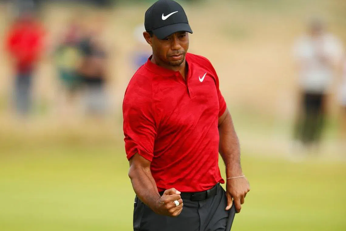 FILE PHOTO: Golf - The 147th Open Championship - Carnoustie, Britain - July 22, 2018   Tiger Woods of the U.S. reacts during the final round  REUTERS/Jason Cairnduff/File Photo