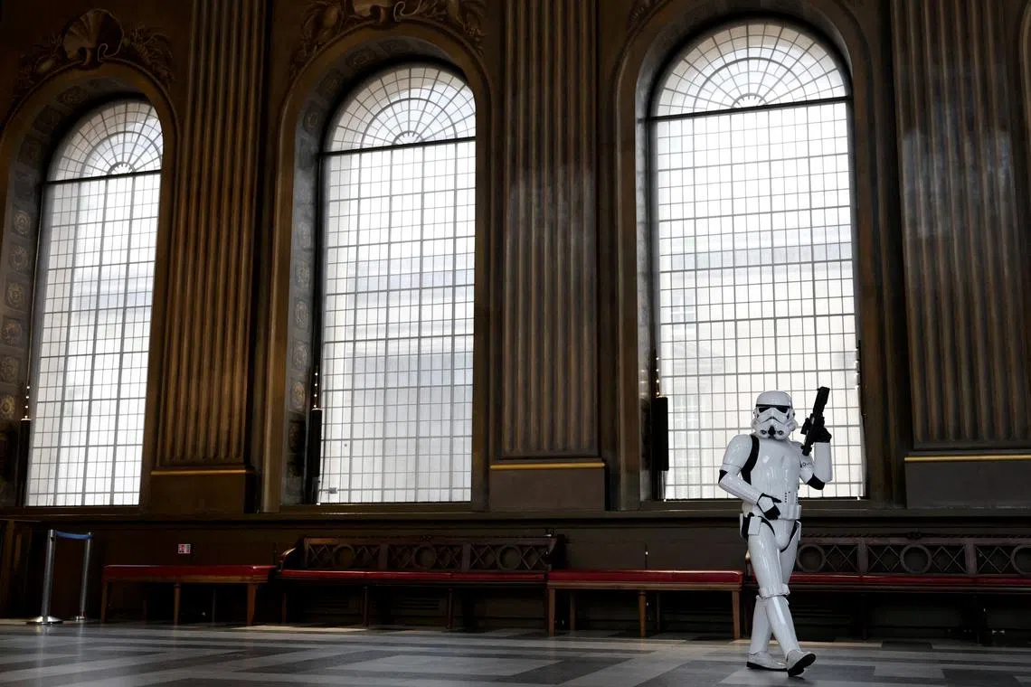 A Star Wars fan dressed as a Stormtrooper walking through the Painted Hall during a press preview ahead of an upcoming Guinness World Record attempt at the Old Royal Naval College in London, Britain, on August 19, 2025. 