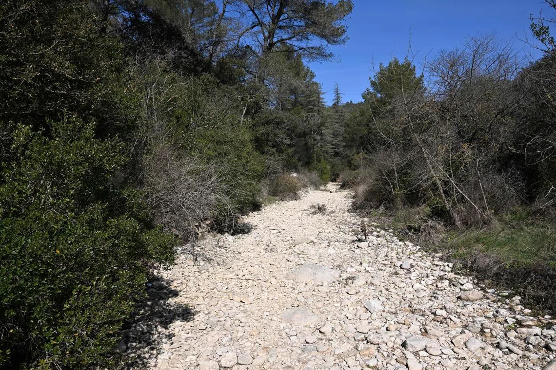 A completely dry riverbed is seen near Lourmarin, southern France, on March 3, 2023.