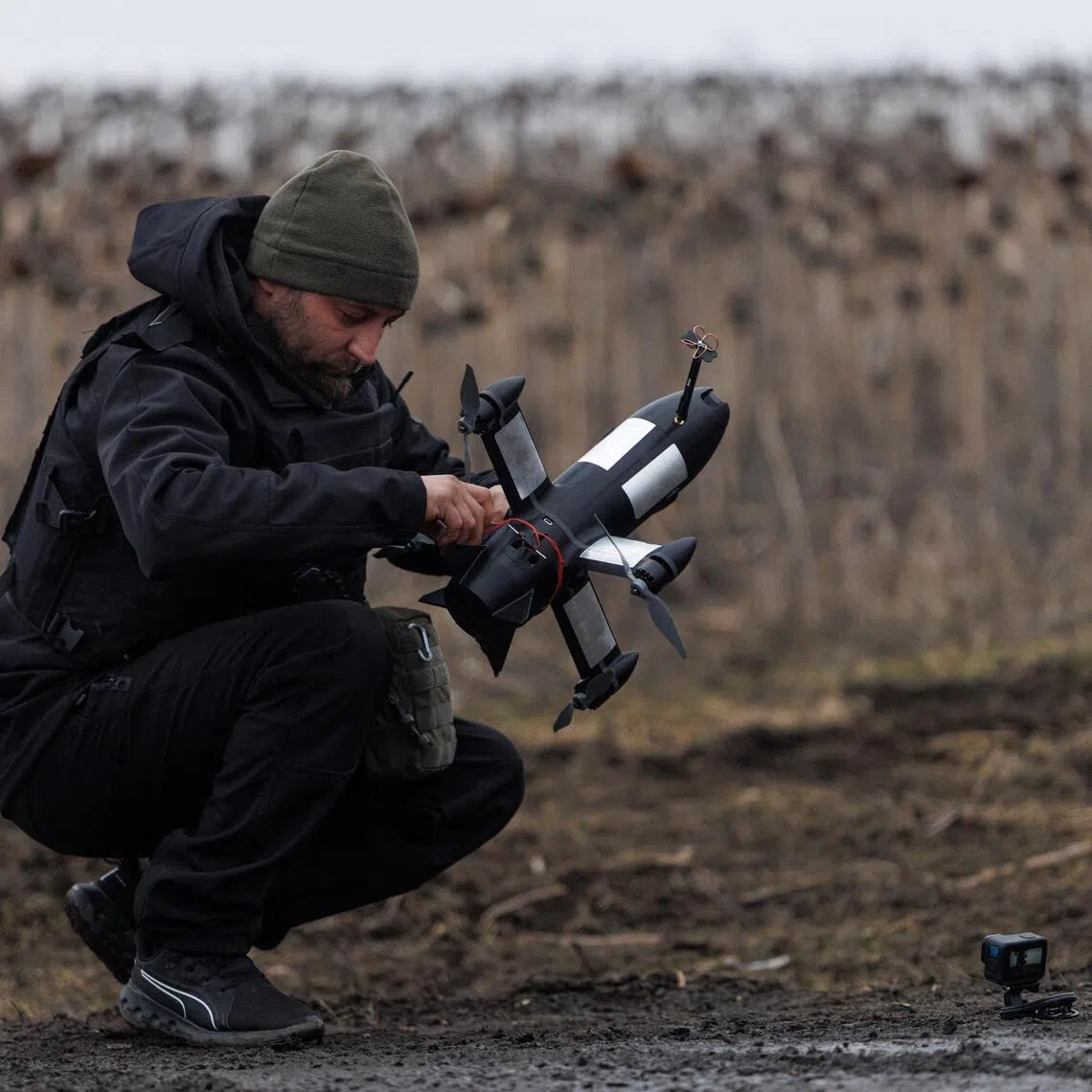 A Ukrainian soldier prepares a P1-Sun drone interceptor, which costs around around US$1,000 (S$1,278) each.
