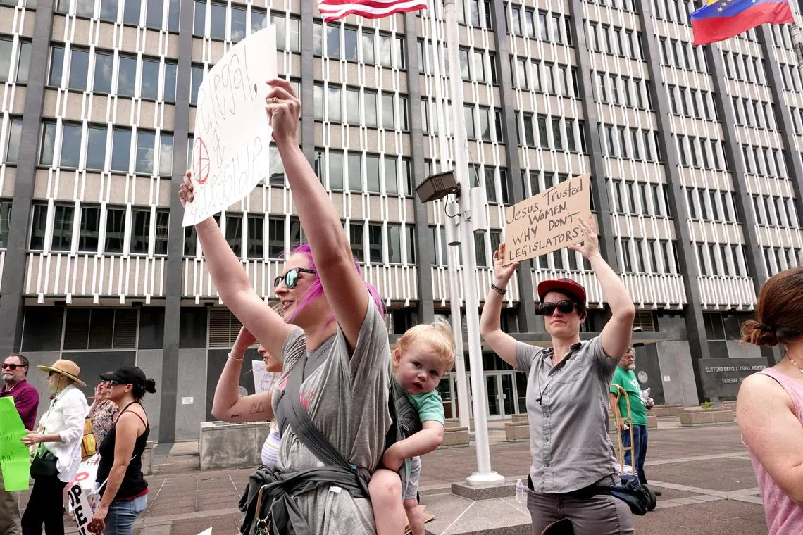 FILE PHOTO: Pro-choice activists assembled in downtown Memphis during a \"Stop Abortion Bans Day of Action\" rally hosted by the Tennessee chapter of Planned Parenthood in Tennessee, U.S., May 21, 2019.  REUTERS/Karen Pulfer Focht/File Photo