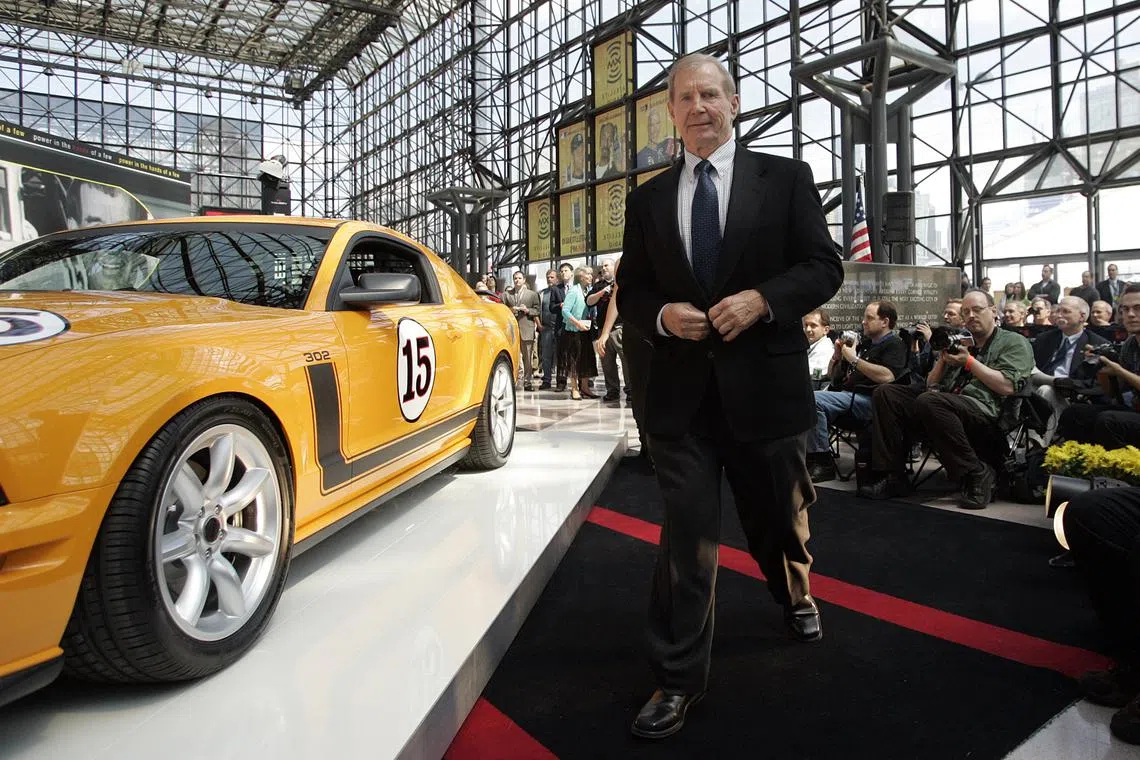 FILE PHOTO: Race car driver Parnelli Jones takes the stage for the unveiling of the 370-horsepower Saleen modified Mustang at the New York International Auto Show in New York April 13, 2006. REUTERS/Keith Bedford/File Photo