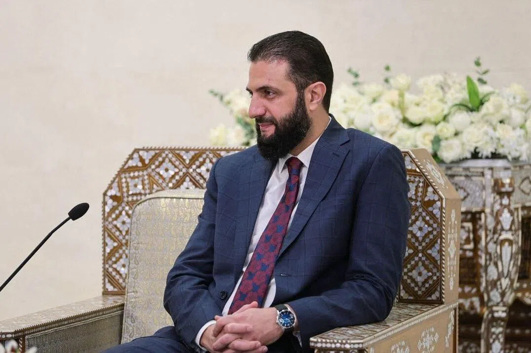 A handout picture released by the official Syrian Arab News Agency (SANA) shows Syria's interim President Ahmad Al-Sharaa meeting a US delegation in Damascus on Sept 12. 